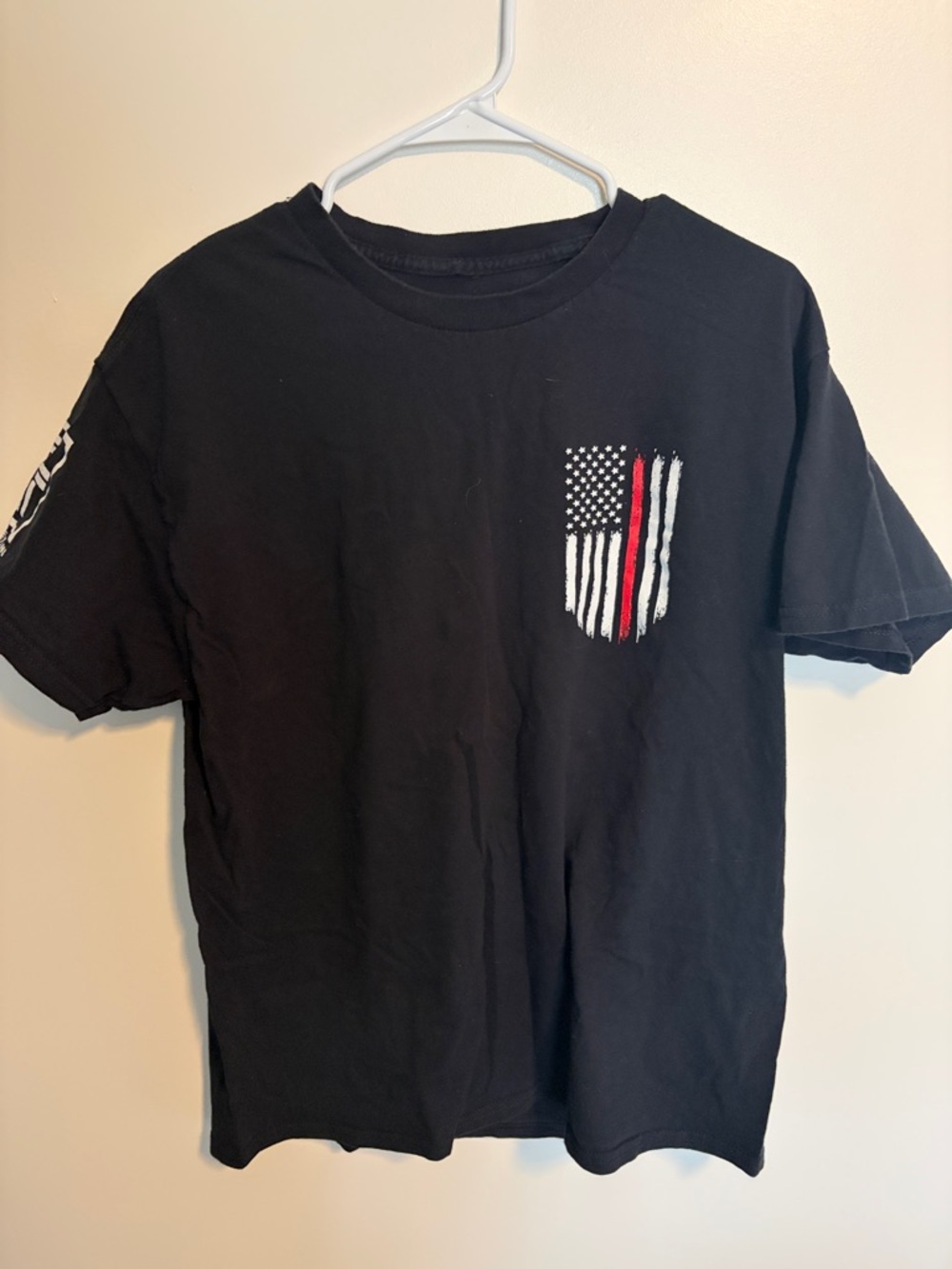 Amazon Black Short Sleeve Tee with Thin Red Line Flag Chest Print